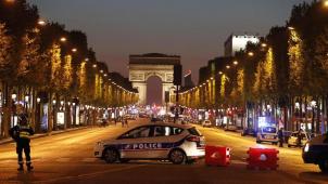 1014743-police-secure-the-champs-elysee-avenue-after-one-policeman-was-kille