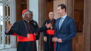 Le cardinal Turkson et Bacher el-Assad
: des sourires qui gênent.