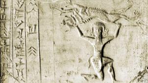 Sceau représentant Gilgamesh, agenouillé et tenant un lion tué au-dessus de sa tête.