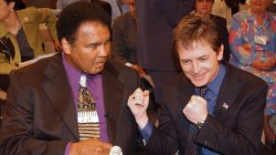 Le boxeur Mohamed Ali (à gauche), victime de la maladie de Parkinson, menait en son temps campagne pour le financement de la recherche médicale.
