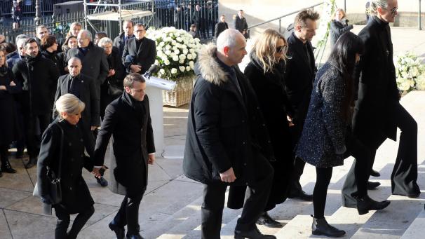 La famille Hallyday suivie du président Emmanuel Macron et de son épouse Brigitte Macron. ©Belga