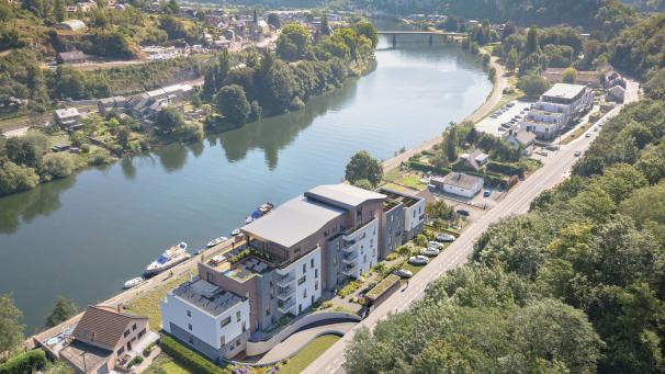 A l’avant-plan, une vue du projet Aura, en bord de Meuse. Le complexe proposera 28 appartements haut de gamme.