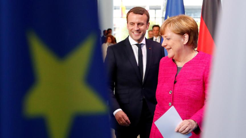 Emmanuel Macron et Angela Merkel. © Reuters.