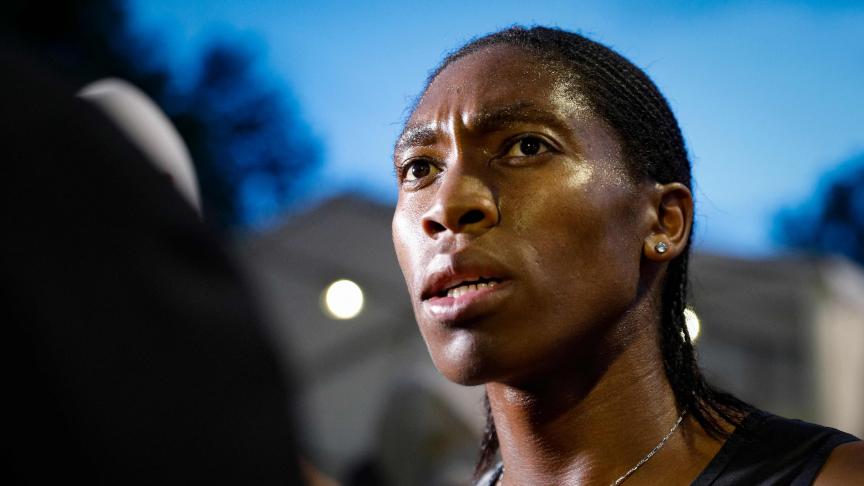 TOPSHOT - South African Caster Semenya speaks with journalists after the women's 2000m race during the France's LNA (athletics national association) Pro Athle Tour meeting on June 11, 2019 at the Jean-Delbert stadium in Montreuil, a Paris neighbouring suburb. - The double 800m Olympic champion, who was racing for the first time since a controversial new gender ruling came into effect, finished in 5min 38.19sec ahead of Ethiopian pair Hawi Feysa and Adanech Anbesa. (Photo by GEOFFROY VAN DER HASSELT / AFP)